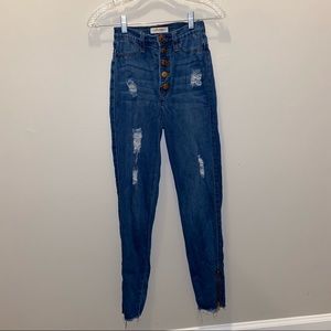 Blue distressed skinny jeans